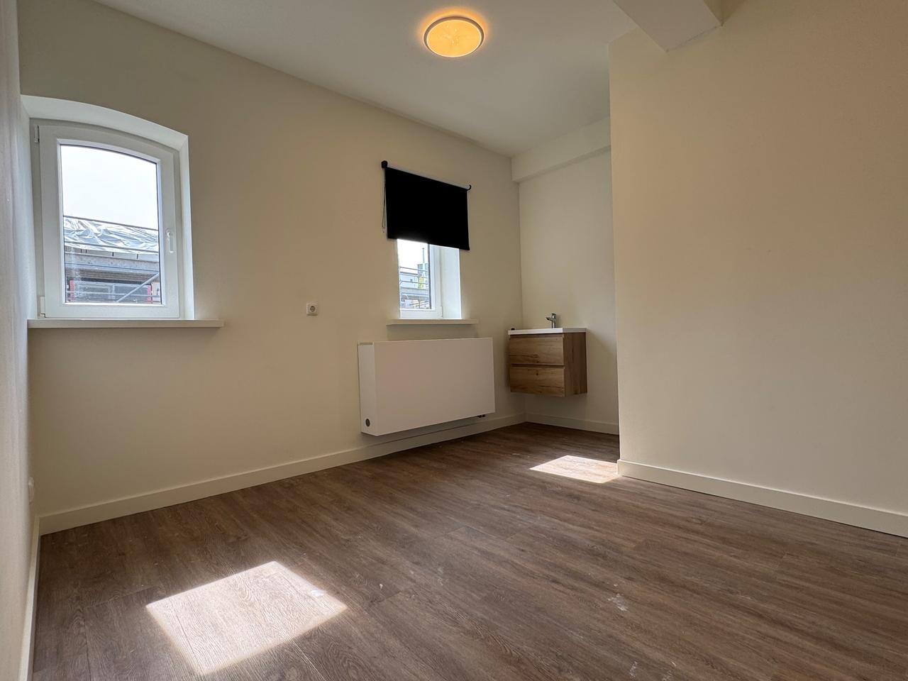 Bright room with kitchen in Helpman - Image 11