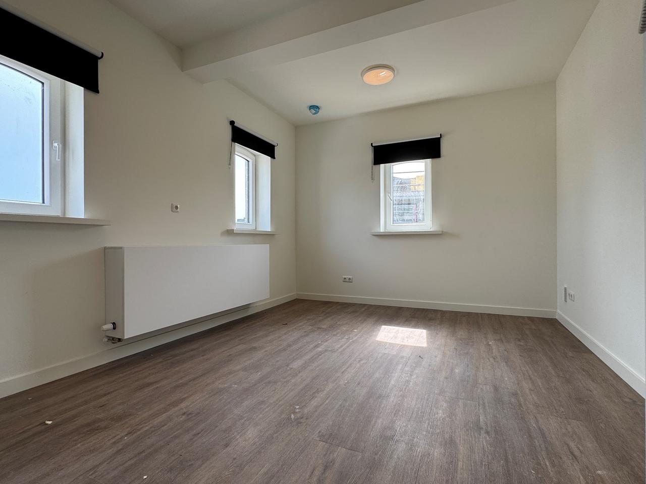 Bright room with kitchen in Helpman - Image 10