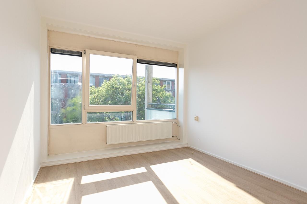 Licht 4-kamer appartement met zonnig balkon in Osdorp - Afbeelding 10