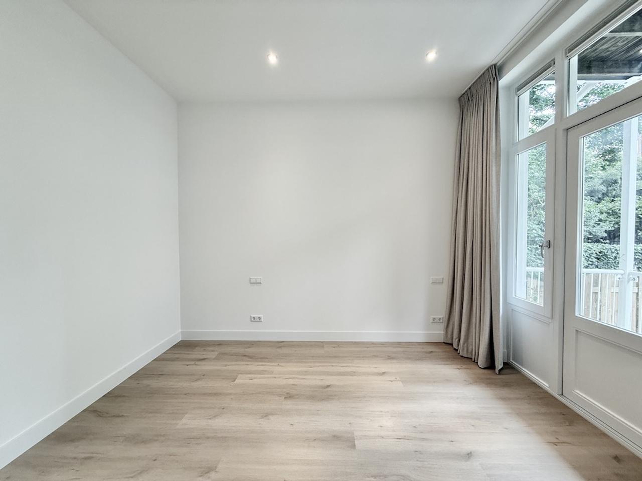 Benedenwoning met tuin aan de Nassaukade - Afbeelding 6
