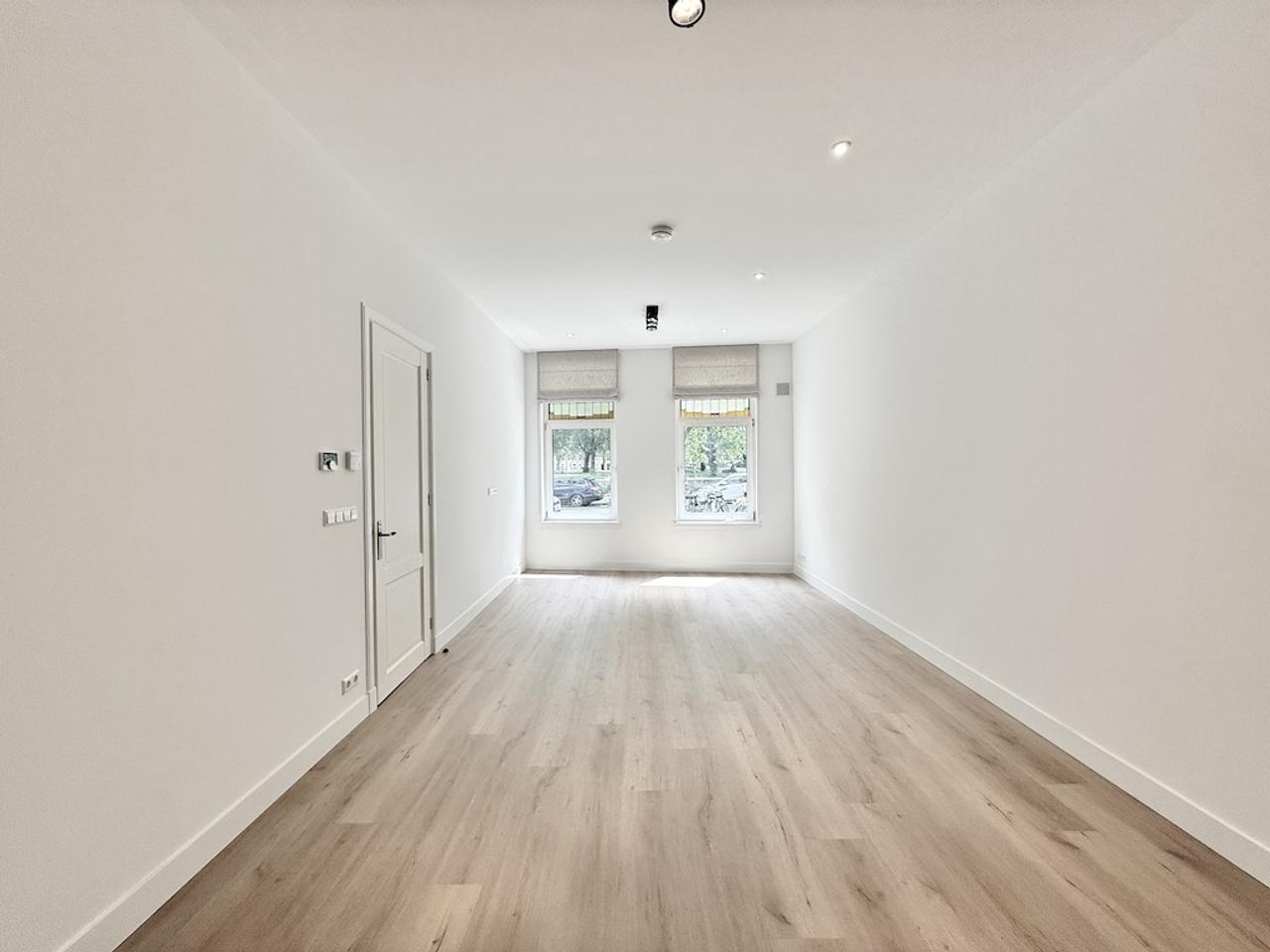 Benedenwoning met tuin aan de Nassaukade - Afbeelding 4