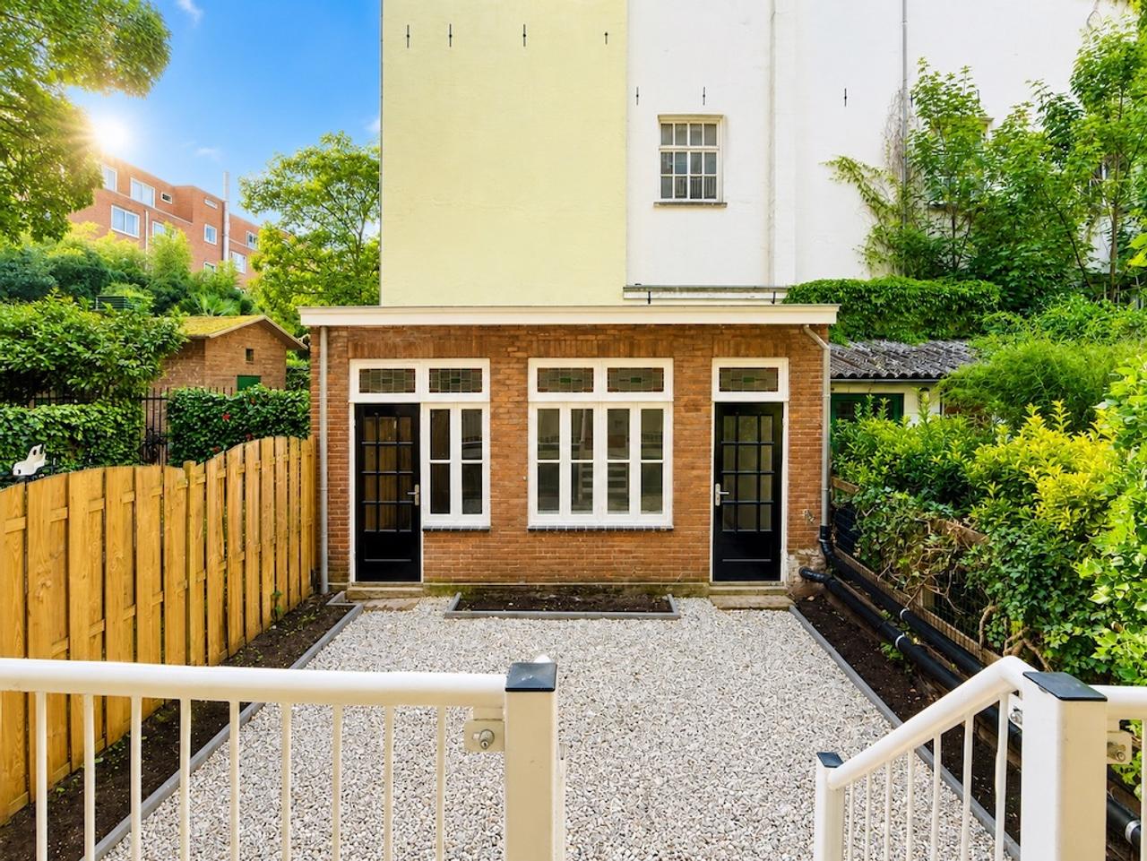 Benedenwoning met tuin aan de Nassaukade - Afbeelding 1