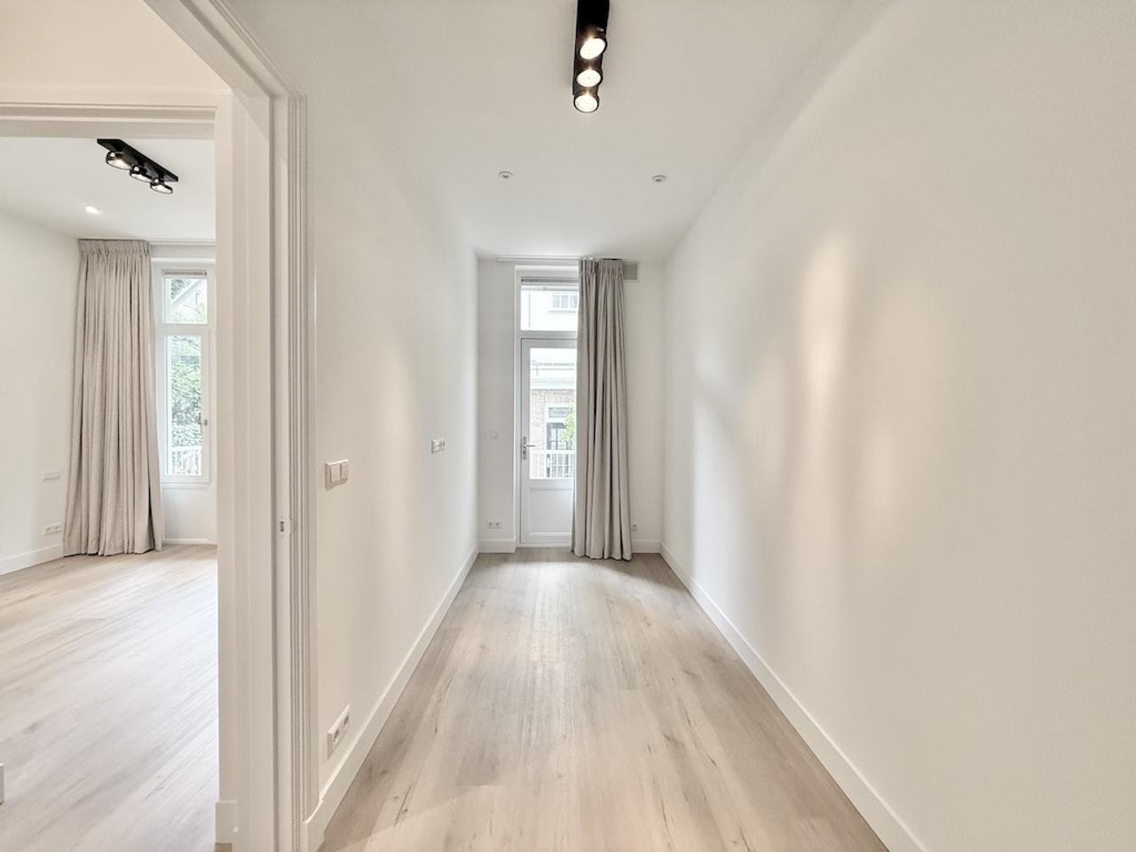 Benedenwoning met tuin aan de Nassaukade - Afbeelding 7