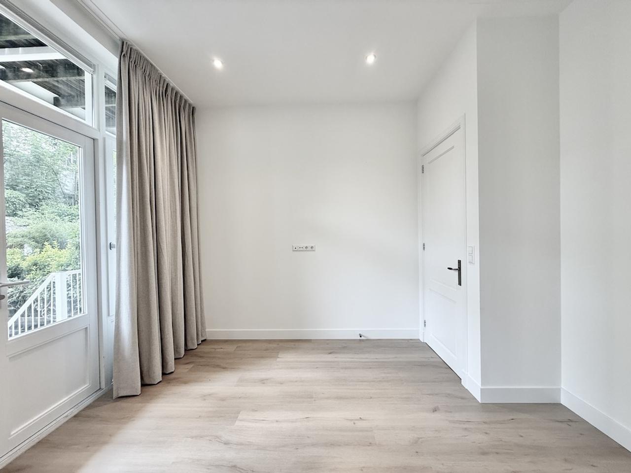 Benedenwoning met tuin aan de Nassaukade - Afbeelding 5