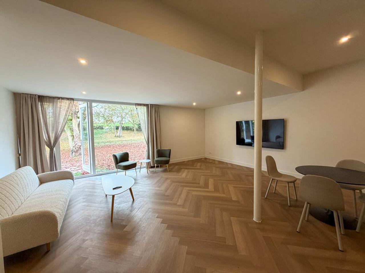 Gemeubileerde 85m² woning met tuin en airco - Afbeelding 2