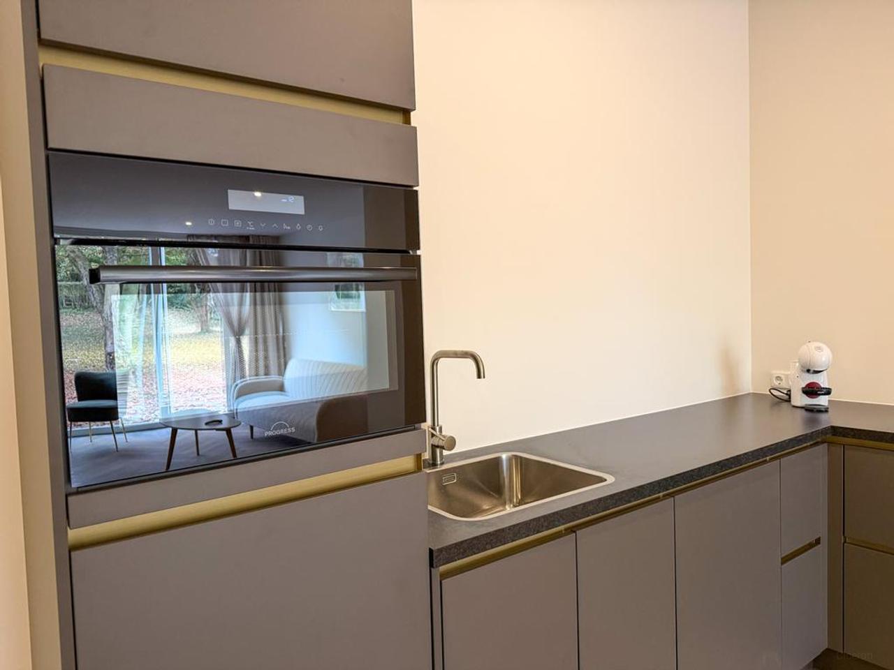 Gemeubileerde 85m² woning met tuin en airco - Afbeelding 4