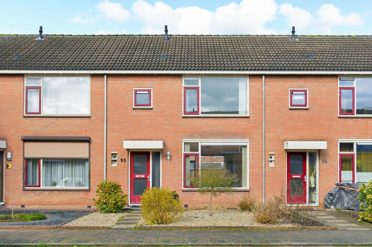 Eengezinswoning van 113 m² met achtertuin - Afbeelding 1