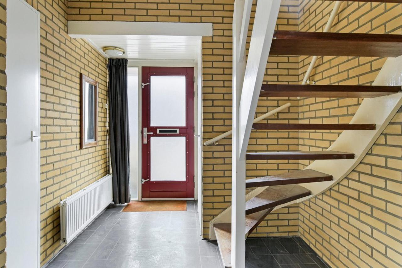 Eengezinswoning van 113 m² met achtertuin - Afbeelding 2