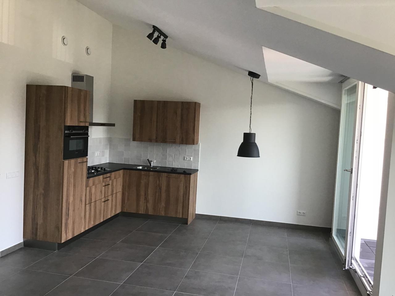 Modern 2-bedroom apartment in the center of Geldrop - Image 1