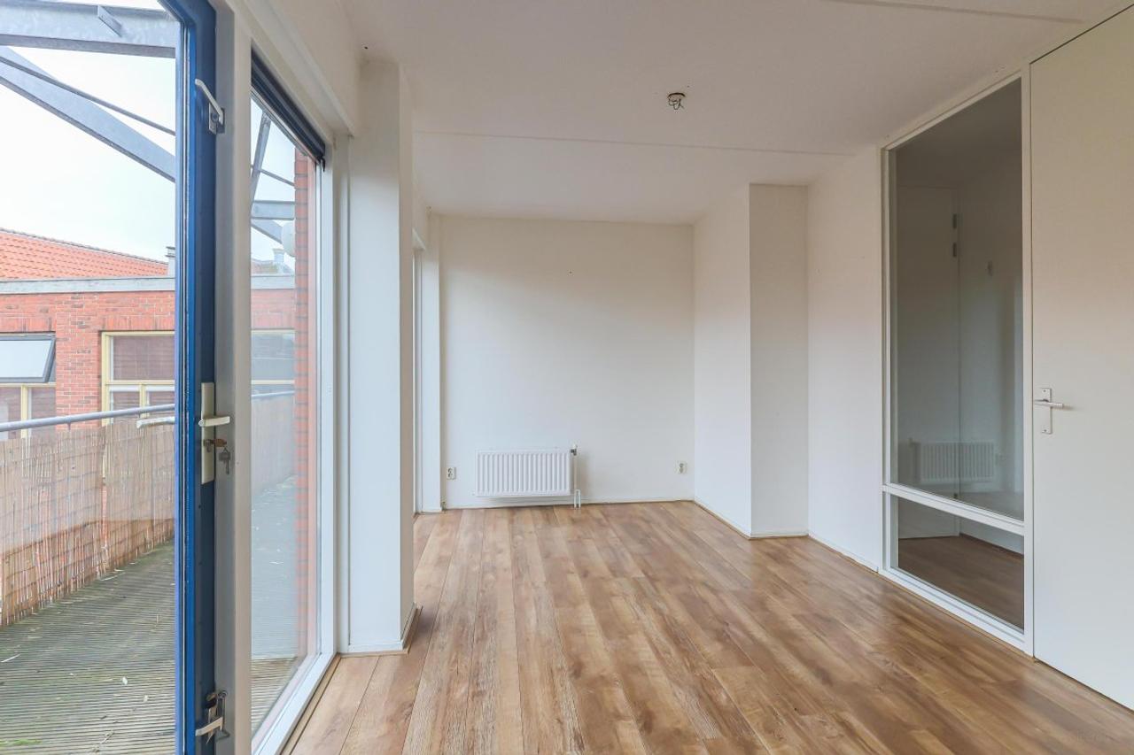 Bovenste verdieping met balkon in centrum - Afbeelding 14