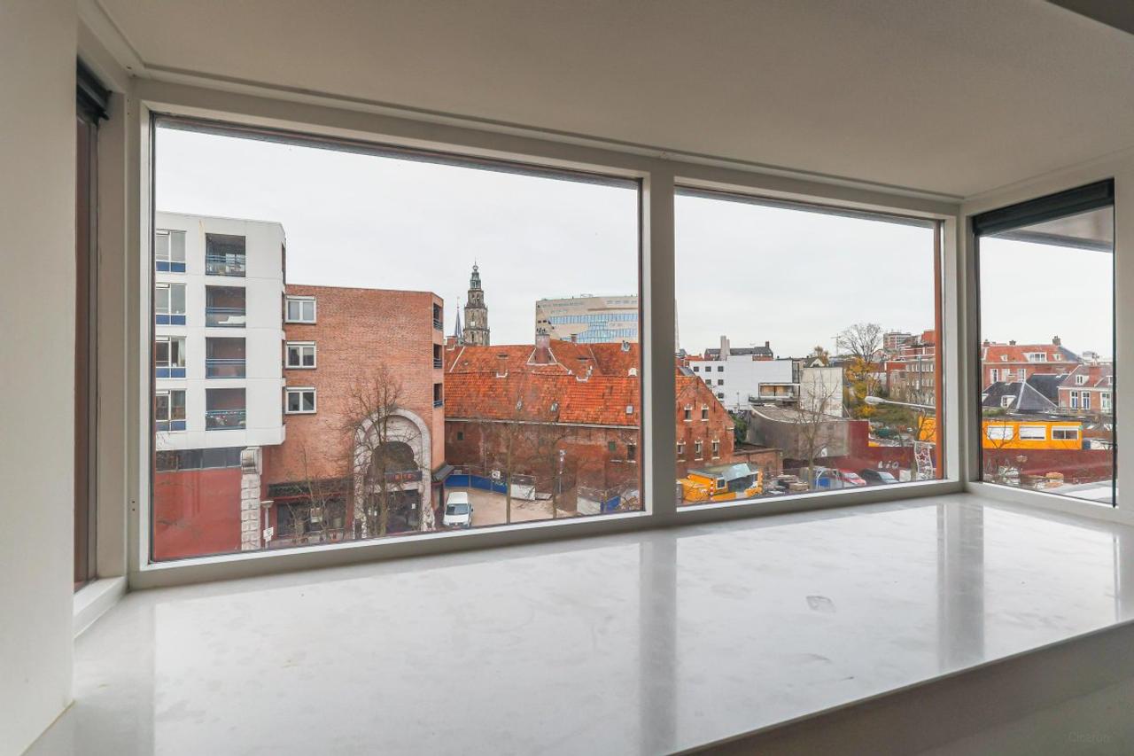 Bovenste verdieping met balkon in centrum - Afbeelding 10
