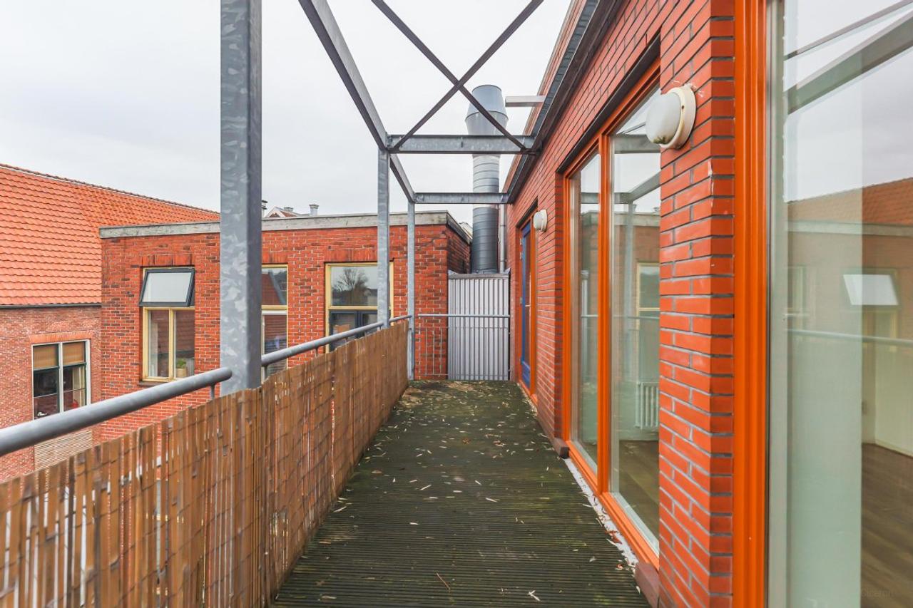 Bovenste verdieping met balkon in centrum - Afbeelding 17