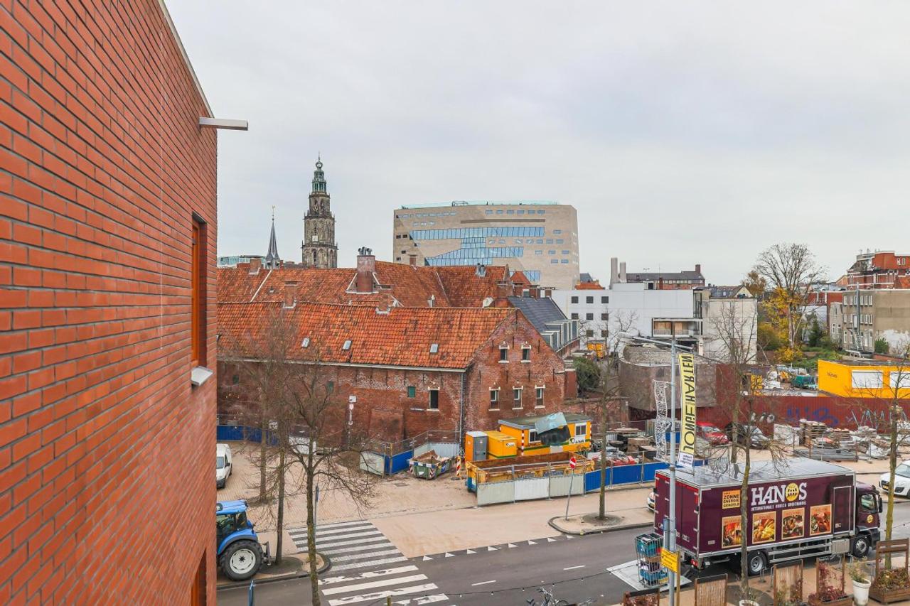 Bovenste verdieping met balkon in centrum - Afbeelding 19