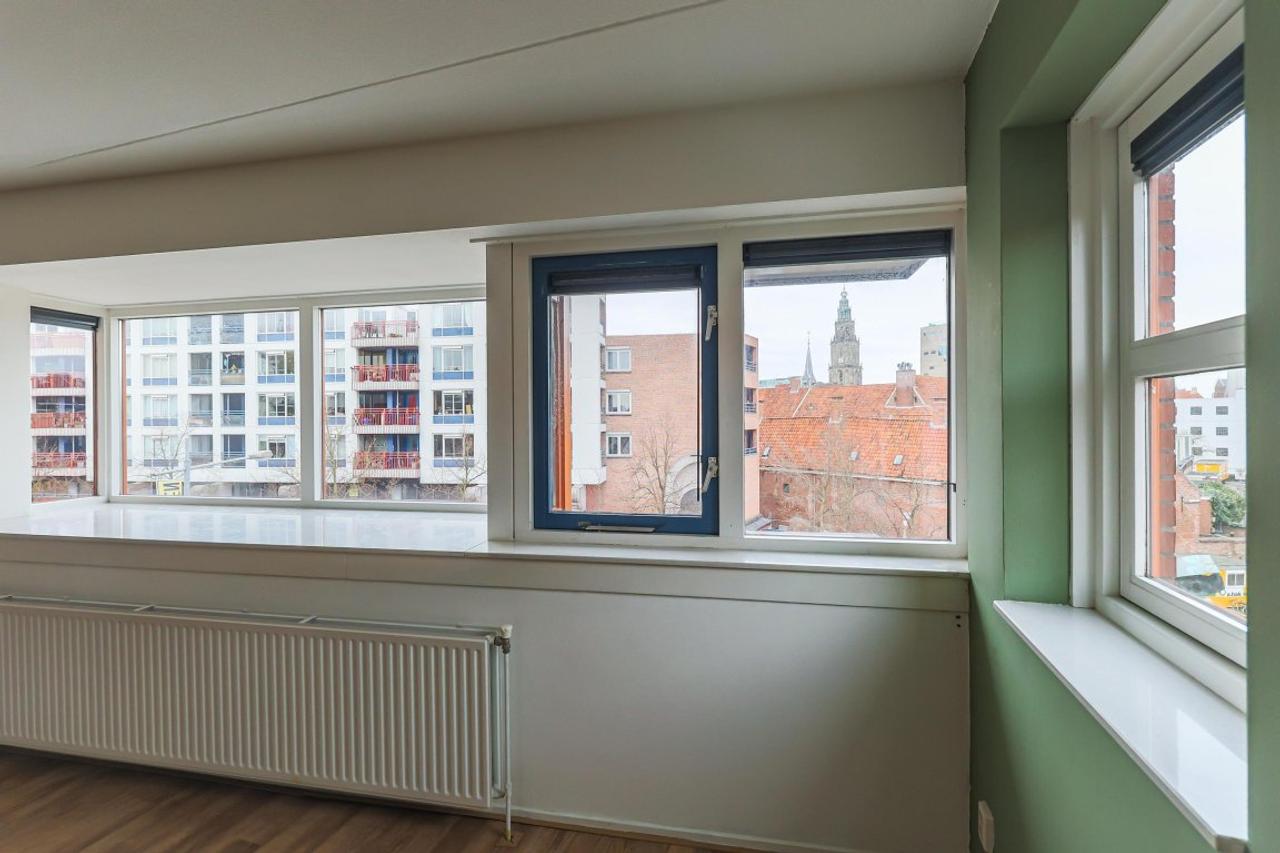 Bovenste verdieping met balkon in centrum - Afbeelding 9