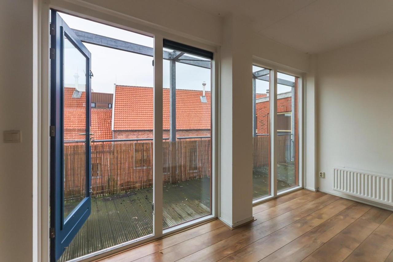 Bovenste verdieping met balkon in centrum - Afbeelding 16