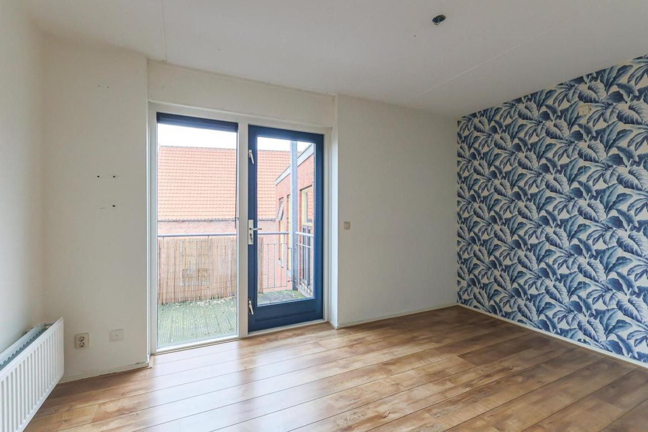 Bovenste verdieping met balkon in centrum - Afbeelding 24