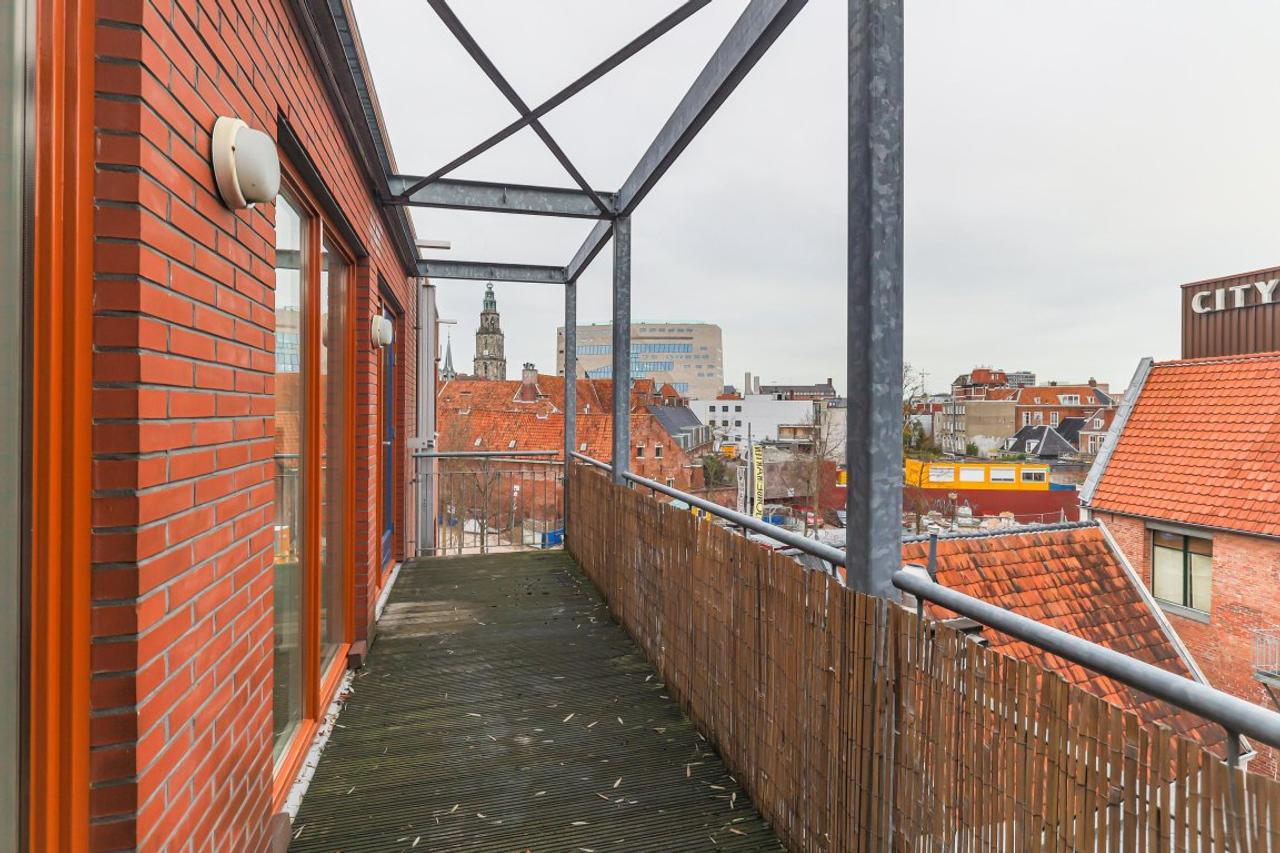 Bovenste verdieping met balkon in centrum - Afbeelding 18