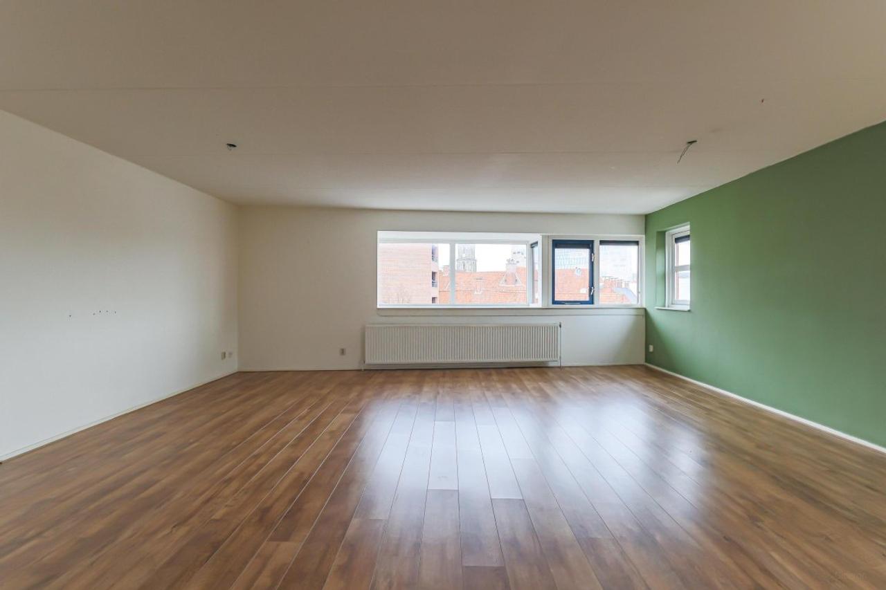 Bovenste verdieping met balkon in centrum - Afbeelding 7