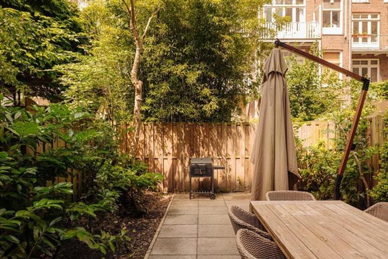 Gemeubileerde benedenwoning met 40m² tuin in Oud-West - Afbeelding 5