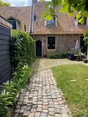 Appartement met tuin bij station