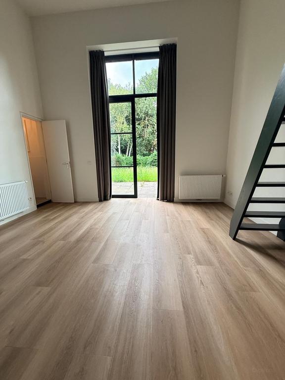 Ground floor apartment with mezzanine - Image 4