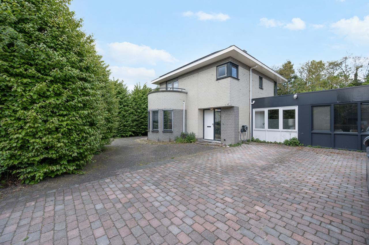 Vrijstaande villa met tuin in Vogelhorst - Afbeelding 1