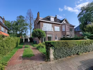 Semi-detached house with garden and garage