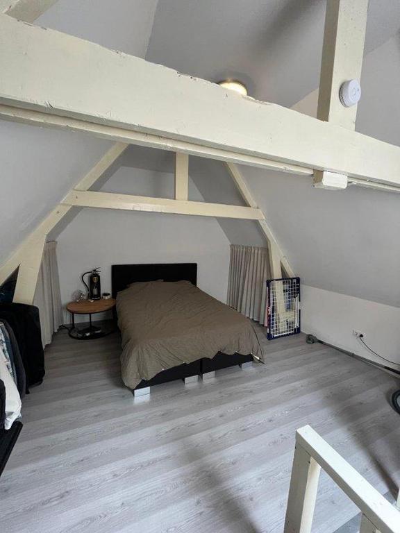 Licht stadsappartement met vide - Afbeelding 4