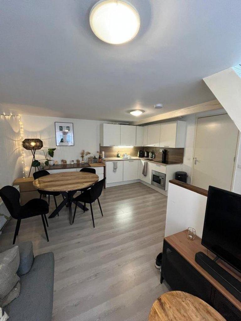 Licht stadsappartement met vide - Afbeelding 2