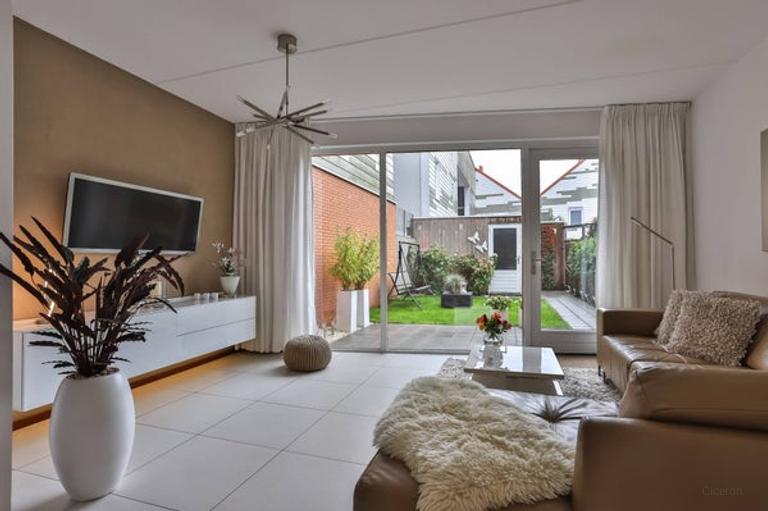 100 m² gezinswoning met tuin op zuidoost - Afbeelding 1