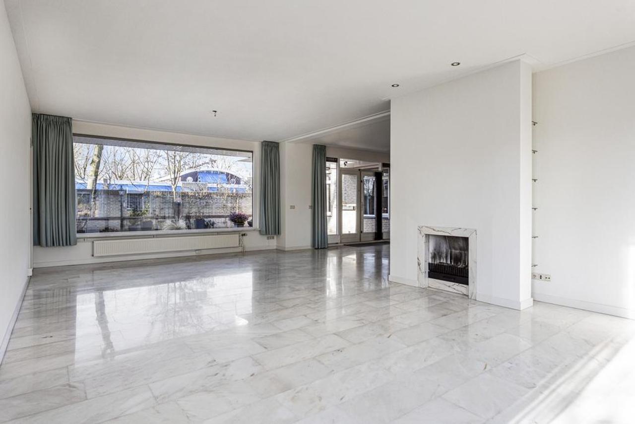 Gelijkvloers wonen met tuin en garage - Afbeelding 12