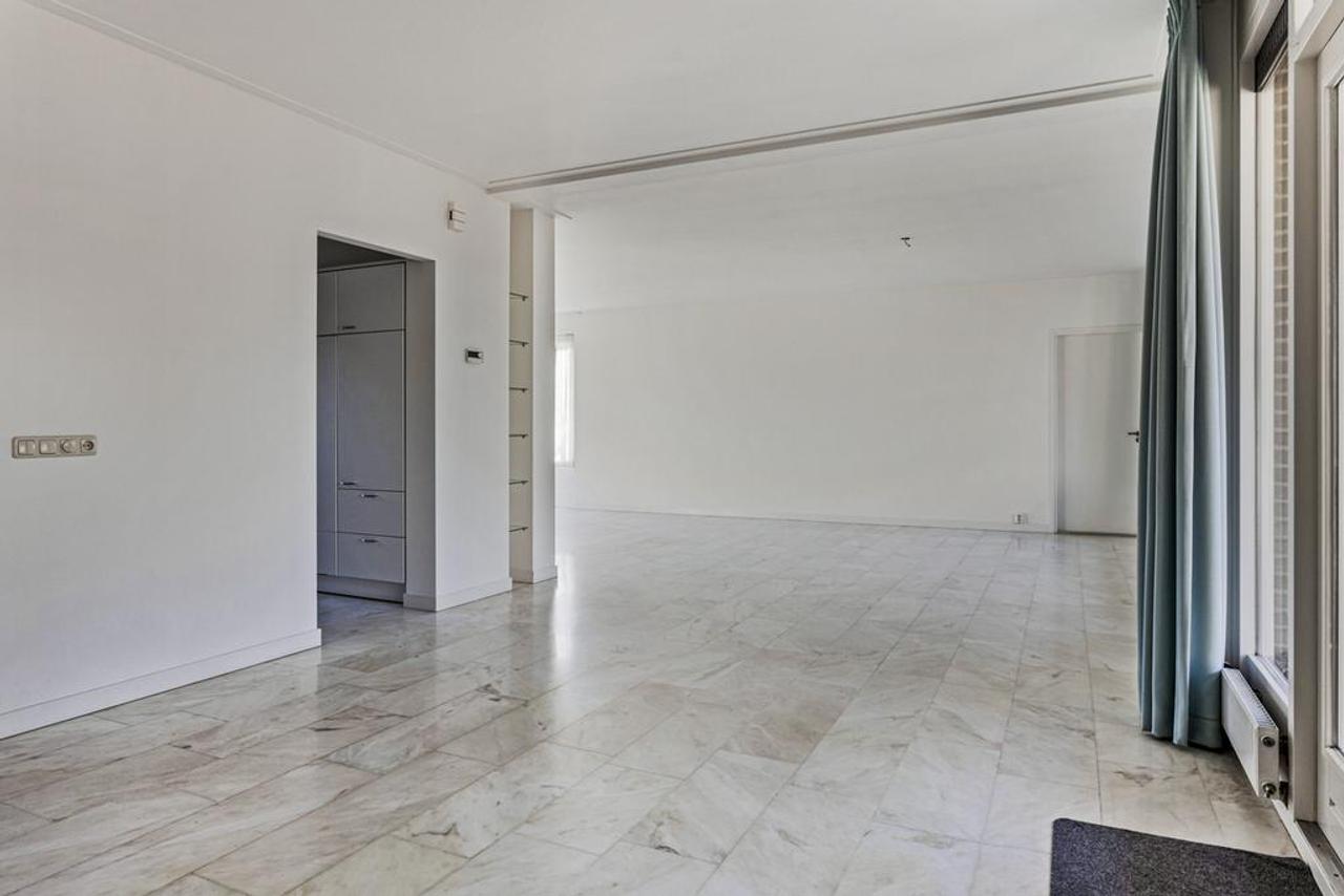 Gelijkvloers wonen met tuin en garage - Afbeelding 9