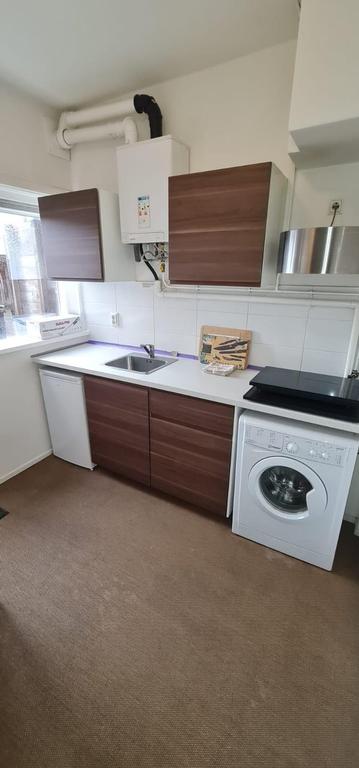 Balkon en woonkeuken in Utrecht West - Afbeelding 12