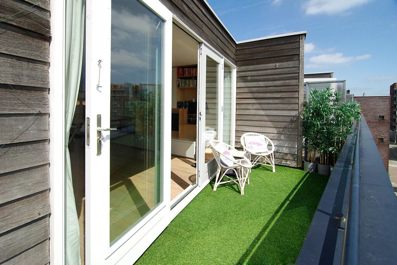 Maisonette met zonnig terras in Westerpark - Afbeelding 3