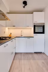 Furnished 2-bedroom apartment with garden