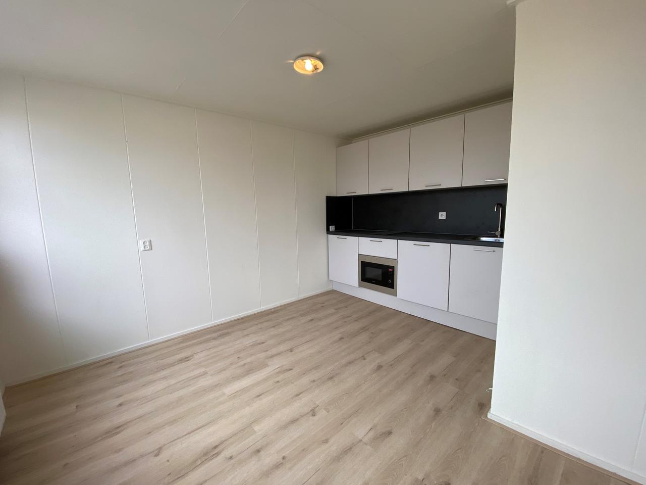 Studentenkamer van 12 m² met eigen keuken in de Oosterpoort - Afbeelding 5