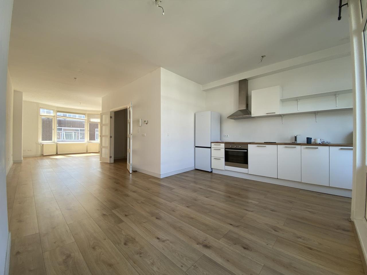 Licht dubbel bovenhuis met 2 slaapkamers - Afbeelding 3