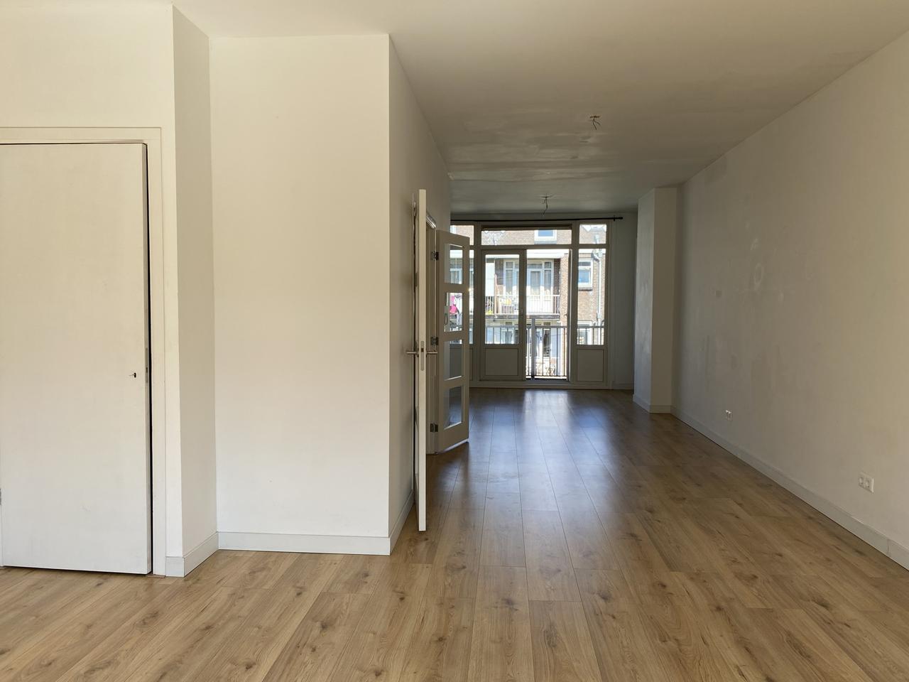 Licht dubbel bovenhuis met 2 slaapkamers - Afbeelding 4