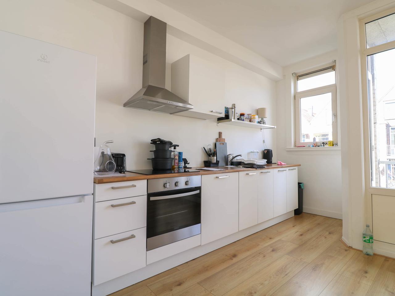 Licht dubbel bovenhuis met balkon - Afbeelding 2