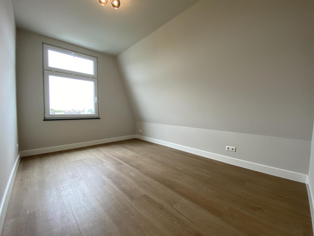 Licht dubbel bovenhuis met balkon - Afbeelding 12