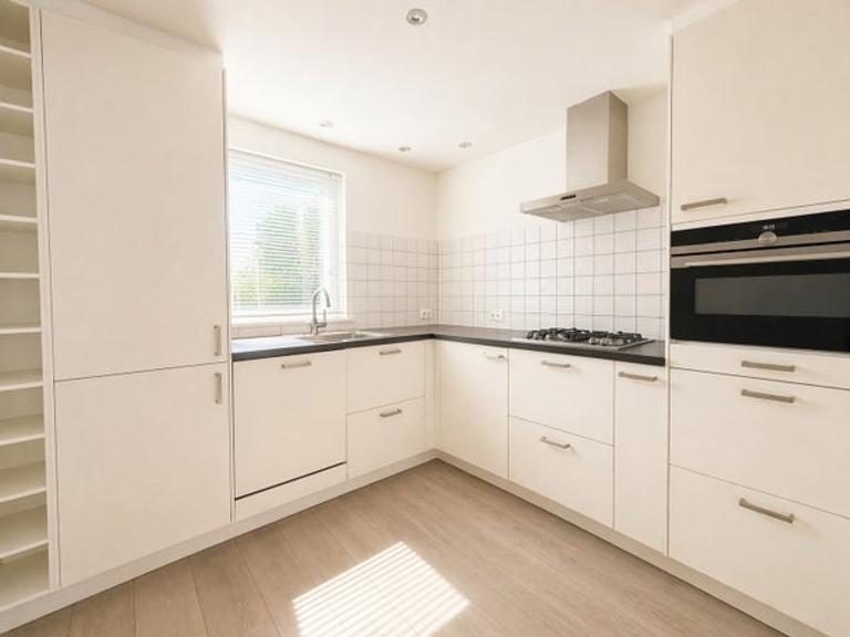 Eengezinswoning met 4 slaapkamers en tuin - Afbeelding 2