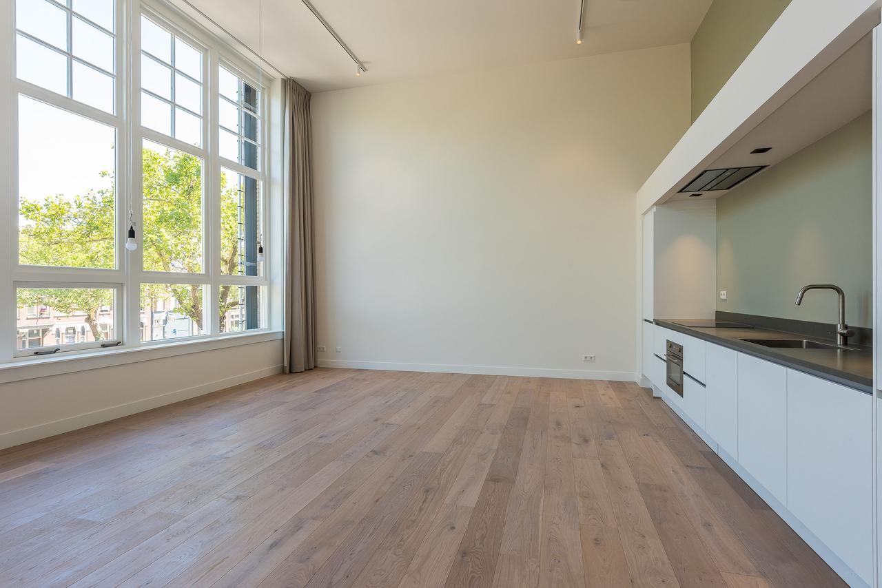 Loft met terras in oud schoolgebouw - Afbeelding 12