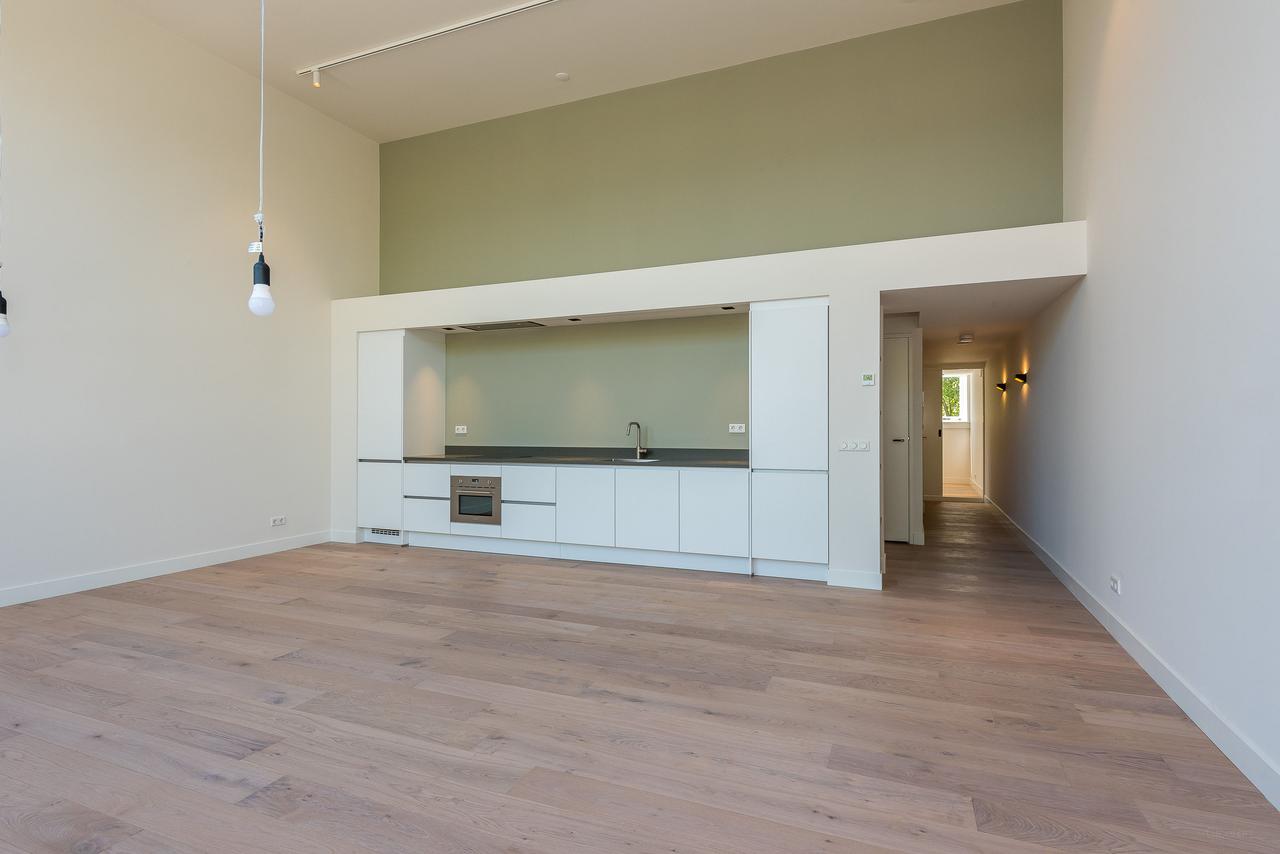 Loft met terras in oud schoolgebouw - Afbeelding 13