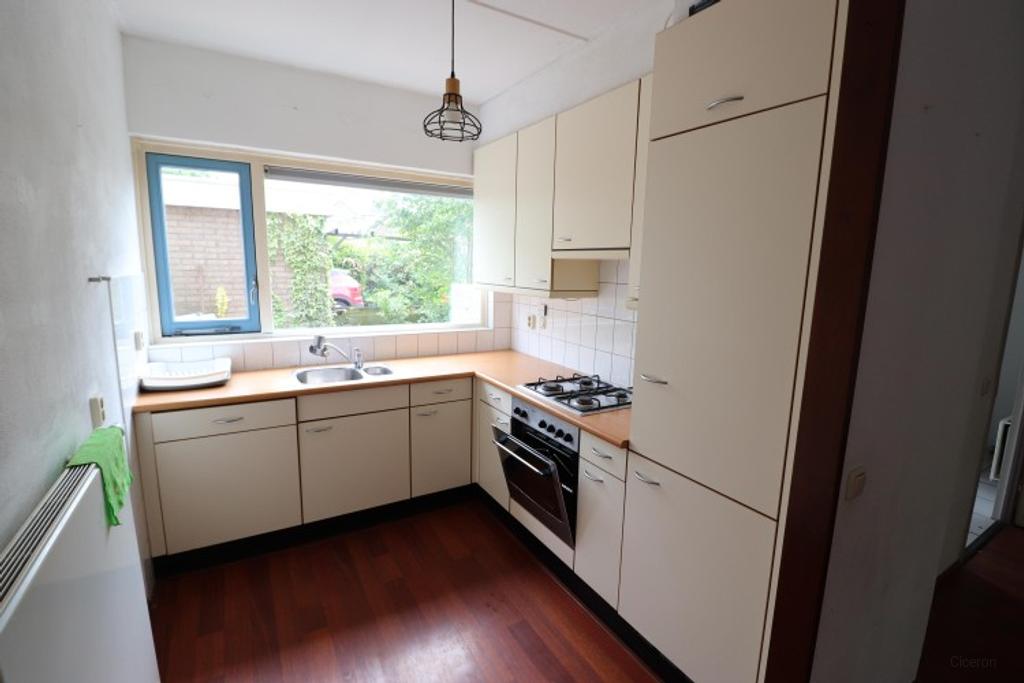 Eengezinswoning met 3 slaapkamers en tuin - Afbeelding 2