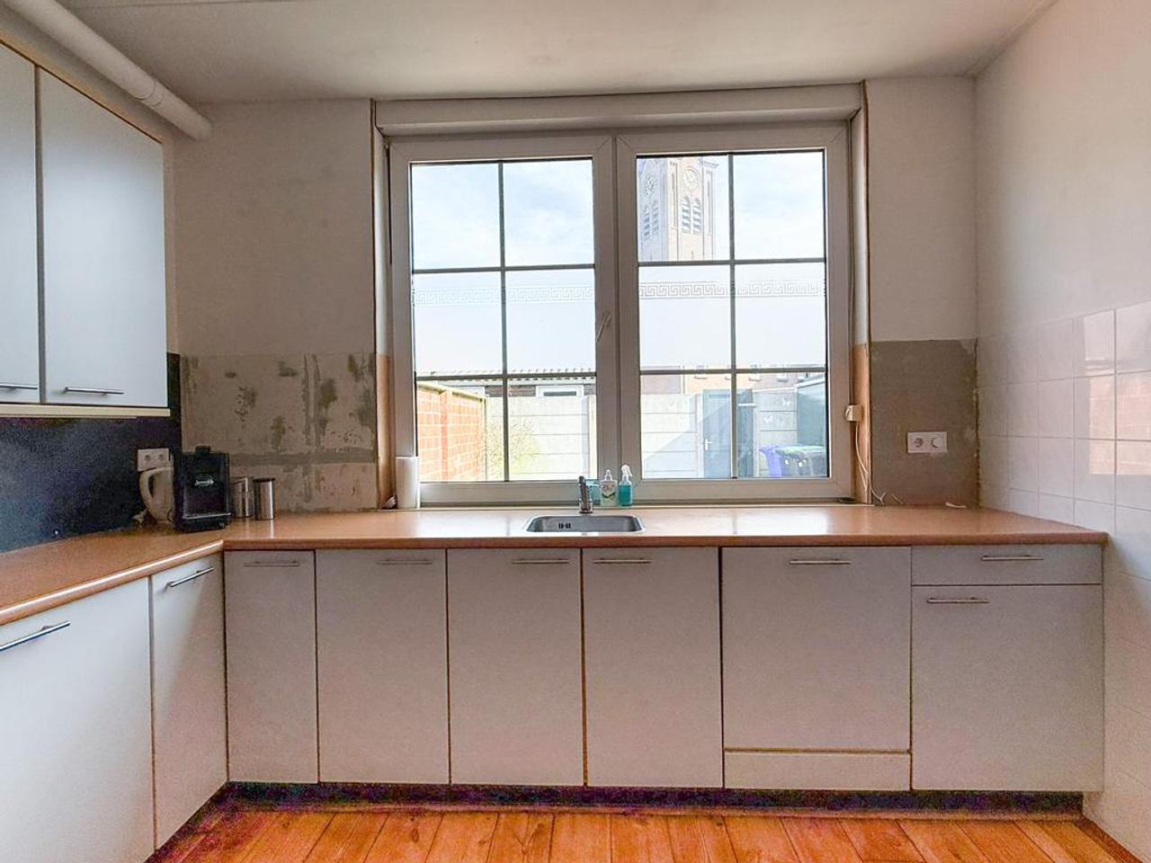 4-slaapkamer huis met tuin in centrum - Afbeelding 9