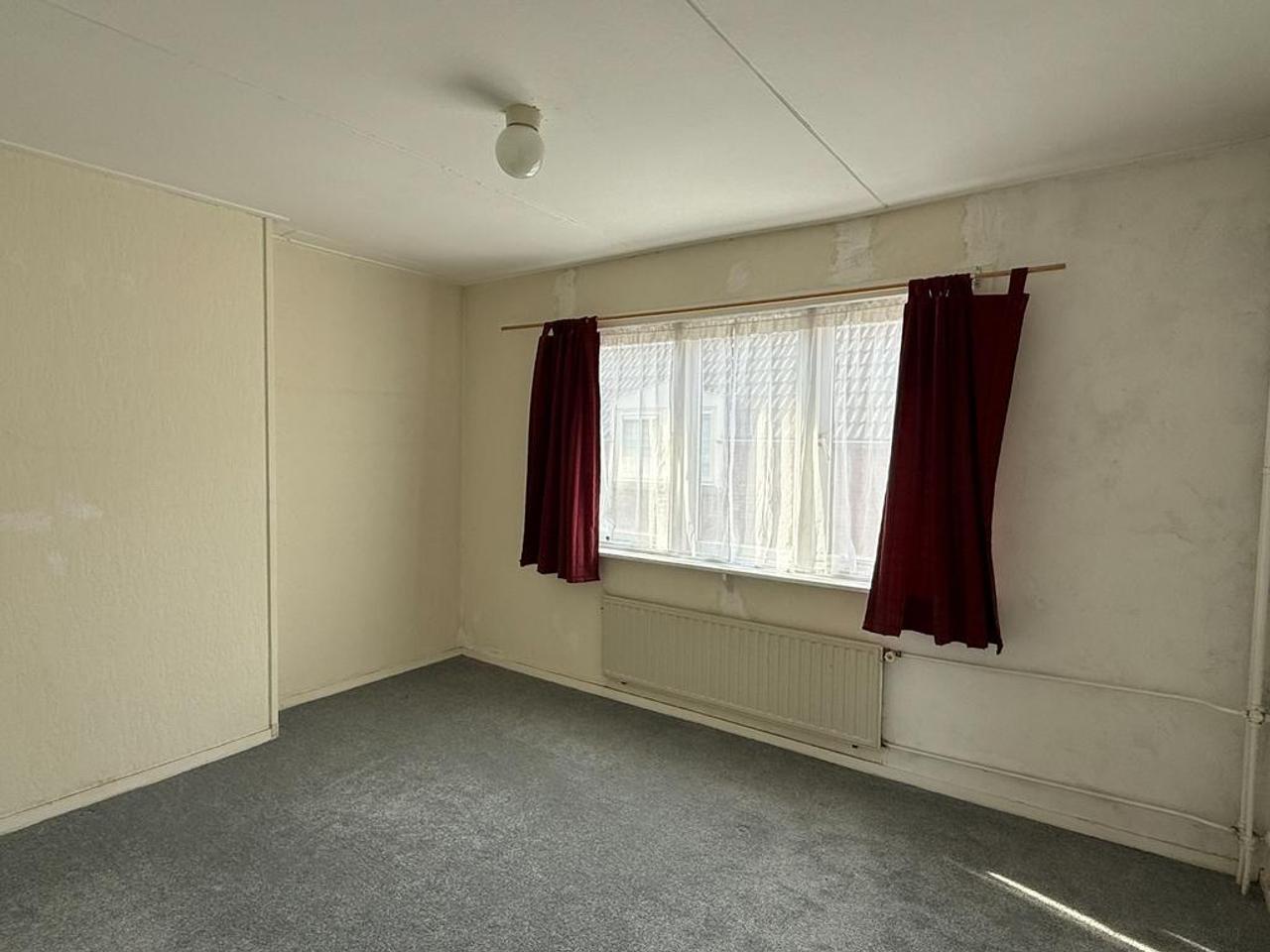 4-slaapkamer huis met tuin in centrum - Afbeelding 13