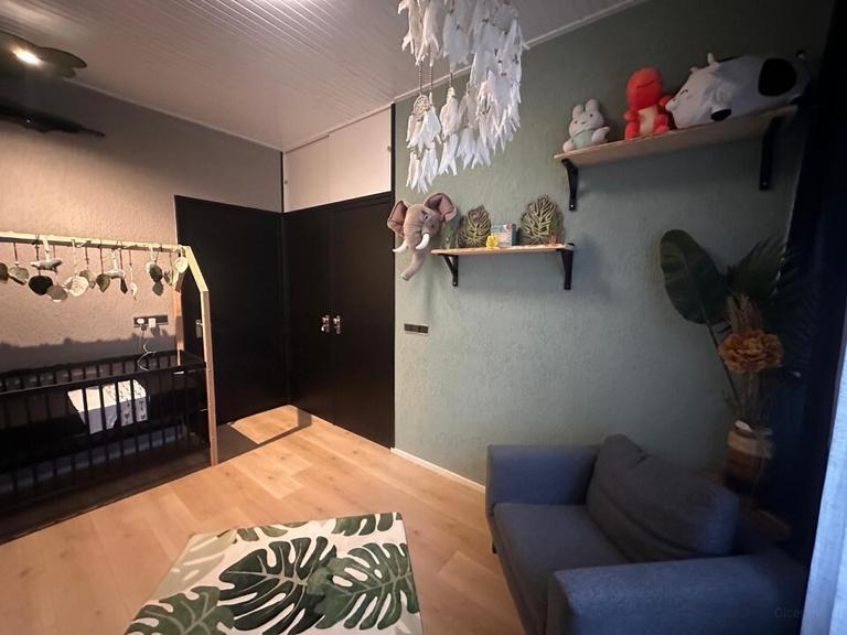 Vrijstaande bungalow met bosrijke tuin - Afbeelding 13
