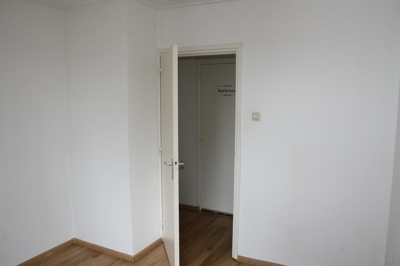 Licht 2e etage appartement met balkon - Afbeelding 11