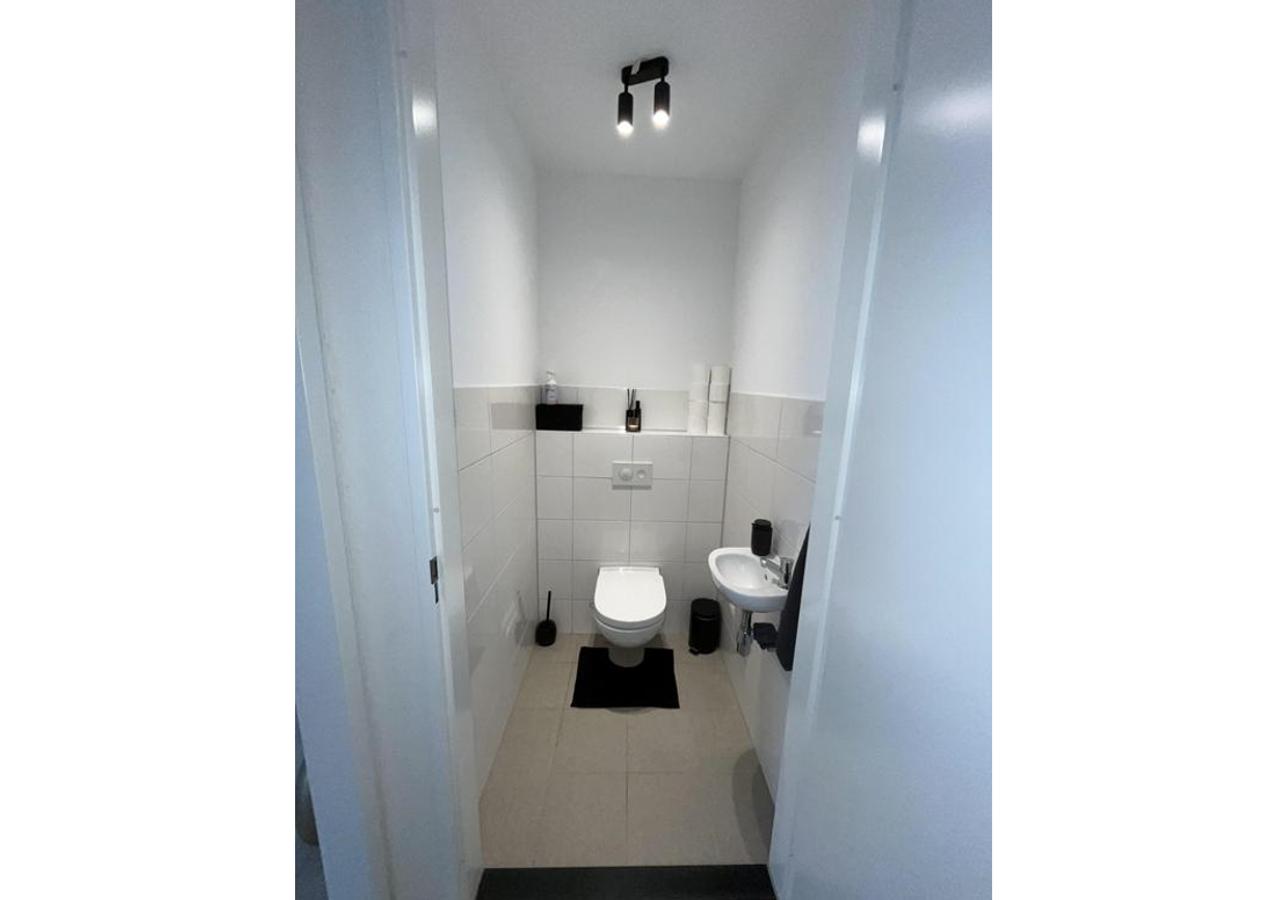 Begane grond appartement met terras - Afbeelding 2