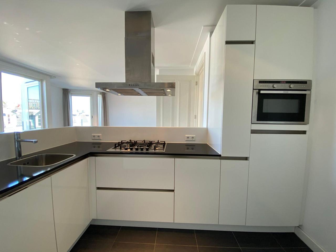 Licht 3-kamerappartement bij Westerpark - Afbeelding 3